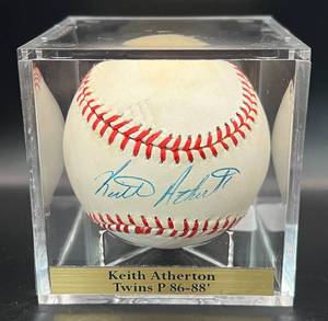 lot 28 image: Keith Atherson (Minnesota Twins Pitcher 1986-88) Signed Vintage Official League Baseball wcube and plaque