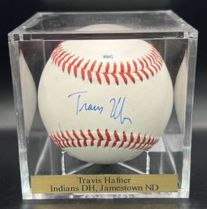 lot 59 image: Travis Hafner (Cleveland Indians DH  Jamestown, ND Hometown) Signed Rawlings OMLB Moor Baseball w cube and plaque