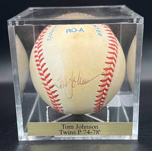 lot 65 image: Tom Johnson (Minnesota Twins Pitcher 1974-78) Signed Rawlings OALB Brown  Baseball w cube and plaque