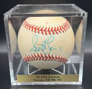 lot 74 image: Scott Leius (Minnesota Twins 3B 199095) Signed Rawlings OALB Brown  Baseball w cube and plaque