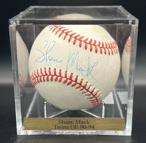 lot 76 image: Shane Mack (Minnesota Twins OF 1990-94) Signed Rawlings ONLB  Baseball w cube and plaque
