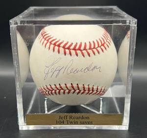 lot 95 image: Jeff Reardon (Minnesota Twins Pitcher) Signed Rawlings OALB Brown Baseball w cube and plaque