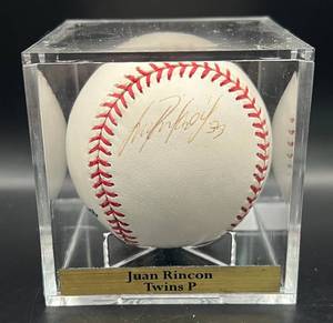 lot 97 image: Juan Rincon (Minnesota Twins Pitcher) Signed Rawlings OMLB Selig Baseball w cube and plaque