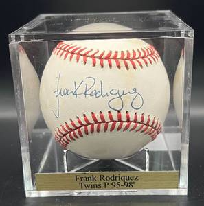 lot 99 image: Frank Rodrigues (Minnesota Twins Pitcher 1995-98) Signed Rawlings OALB Budig Baseball w cube and plaque