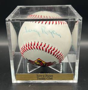 lot 103 image: Terry Ryan (Minnesota Twins GM) Signed Fotoball Baseball w cube and plaque