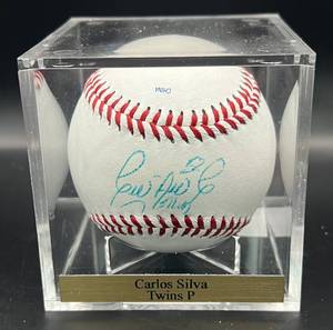 lot 104 image: Carlos Silva (Minnesota Twins Pitcher) Signed ROLB Baseball w cube and plaque