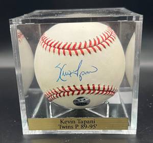 lot 108 image: Kevin Tapani (Minnesota Twins Pitcher 1989-95) Signed Rawlings OMLB Selig Baseball w cube and plaque