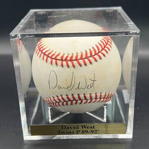 lot 112 image: David West (Minnesota Twins Pitcher 1989-92) Signed Rawlings OALB Brown Baseball w cube and plaque