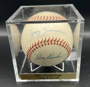 lot 116 image: Jerry Zimmerman (Minnesota Twins Catcher 1962-68) Sined Vintage Spalfing Baseball w cube and plaque