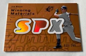 lot 16B image: Joe Mauer Game-Used Patch 199 2007 SPx Major League Baseball Winning Materials #WM-JM, numbered 039199 Minnesota Twins Baseball Card