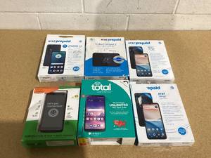 lot 493 image: LOT OF 5 Miscellaneous Pre Paid Phones and One Hot Spot
