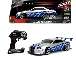 lot 431 image: Fast & Furious Brians Nissan Skyline GT-R (BN34) Drift Power Slide RC Radio Remote Control Toy Race Car with Extra Tires, 110 Scale, SilverBlue (99701)