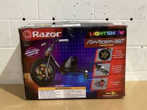 lot 596 image: Razor RipRider 360 Lightshow - Drift Trike with Colorful Lights, 3 Wheeled Ride-on Toy for Kids 5
