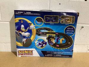 lot 601 image: NKOK Sonic the Hedgehog All Stars Racing Transformed RC Slot Car Race Set in Blue