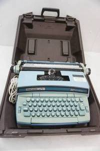 lot 45 image: Vintage Typewriter and case Smith-Corona