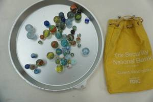 lot 20 image: Marbles and Bag (tin tray not included)