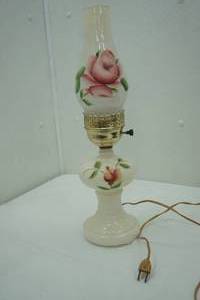 lot 69 image: 18 plug-in lamp Rose oil lamp