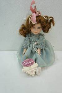 lot 139 image: musical porcelain doll Carolyn