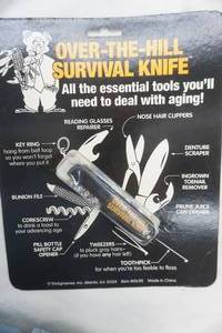 lot 168 image: Over The Hill Survival Knife (in original packaging)