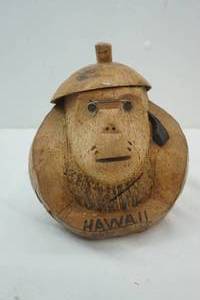 lot 218 image: Hawaii carved coconut coin bank 9 tall
