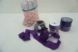 lot 255 image: purple crepe paper, duck tape, and ribbon