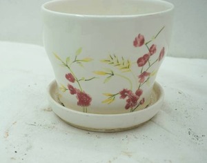 lot 285 image: flower planter 5.5 tall by 6 diameter