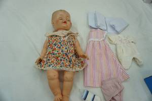 lot 347 image: Vintage Doll with clothes