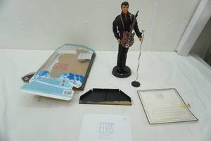 lot 351 image: Elvis doll