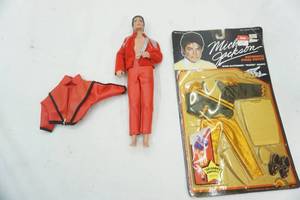 lot 352 image: Michael Jackson doll , outfit