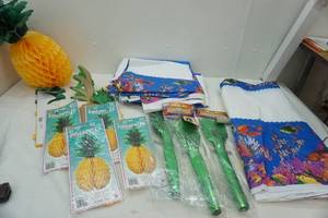 lot 413 image: 12 & 16 tissue Pineapples, poly tablecloths, palm tree centerpieces