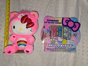 lot 3 image: hello kitty lip gloss set and stuffy