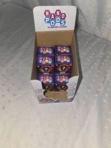 lot 29 image: 10 marvel nano pods
