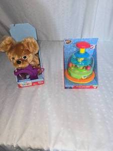 lot 55 image: toy puppy and spin toy