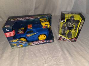 lot 86 image: robot figure and toy car