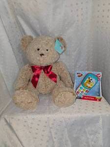 lot 100 image: stuffy and toy phone