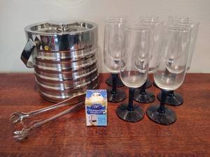 lot 67 image: Stainless Ice Bucket, Eight Champagne Flutes & Champagne Cork