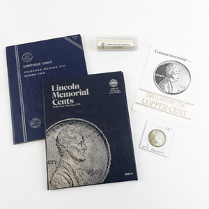 lot 248 image: partial Lincoln album starting 1941, 1 roll of uncirculated memorial cents, 40% Kennedy half