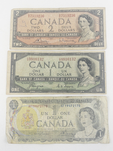 lot 287 image: Canadian Currency Series 1954 2 dollar bill, Series 1954 1 dollar bill, Series 1973 1 dollar bill