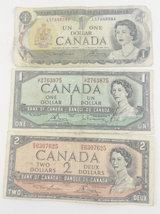 lot 288 image: Canadian Currency Series 1954 2 dollar bill, Series 1954 1 dollar bill, Series 1973 1 dollar bill