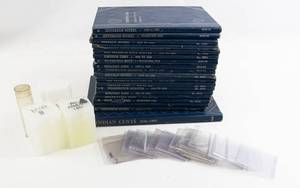 lot 339 image: Large bag of 19 used empty coin folders and misc. supplies