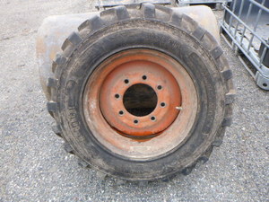lot 161 image: BobcatSkidsteer Tire with Rim