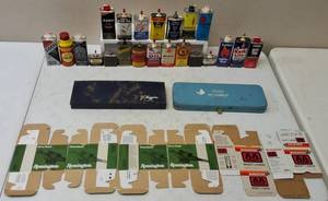 lot 4 image: Assortment of Vintage Gun Oil & Lighter Fluid (Cans Might not be Full or Empty), Ammo Boxes & Gun Cleaning Kits View Photos