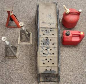 lot 57 image: (1 Set) Car Ramps (3) Jack Stands (2) Gas Cans View Photo