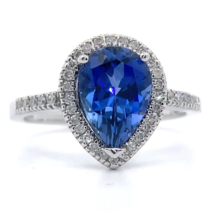 lot 19 image: NEW 0.15 Carat Natural Diamond & Lab-Grown Sapphire Pear Halo Ring in 14k White Gold VIDEO