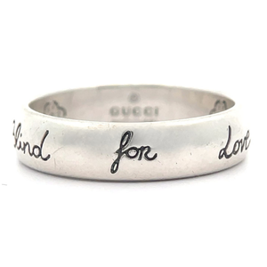 lot 31 image: Gucci Engraved Blind for Love Sterling Silver Band Ring VIDEO