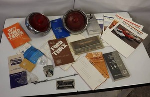 lot 13 image: LOT OF MISC. FORD ITEMS INCLUDING TAIL LIGHTS, OLD COLLATERAL, VINTAGE CHROME TRIM PIECES