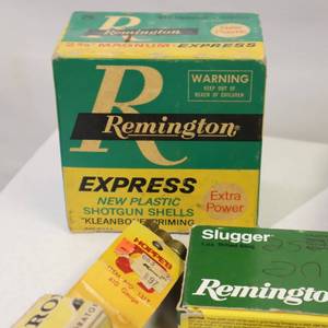 lot 18 image: GUN RELATED ITEMS - vintage shell box, box of shells, gun pencil, holsters, operating manuals & more