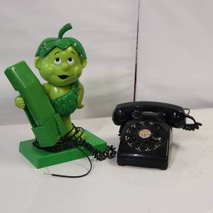 lot 22 image: HO HO HO, WHOS ON THE PHONE  Jolly Green Giant  Plus, a vintage rotary phone from 1968