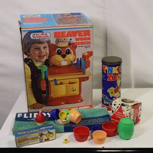 lot 23 image: VINTAGE GAMES IN ORIGINAL BOXES - magic 8 ball, Flippy the fishing game, a happy sipping bird and more