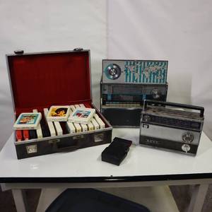 lot 64 image: Lot of 8 Tracks in case and Vintage SW radio  another vintage radio